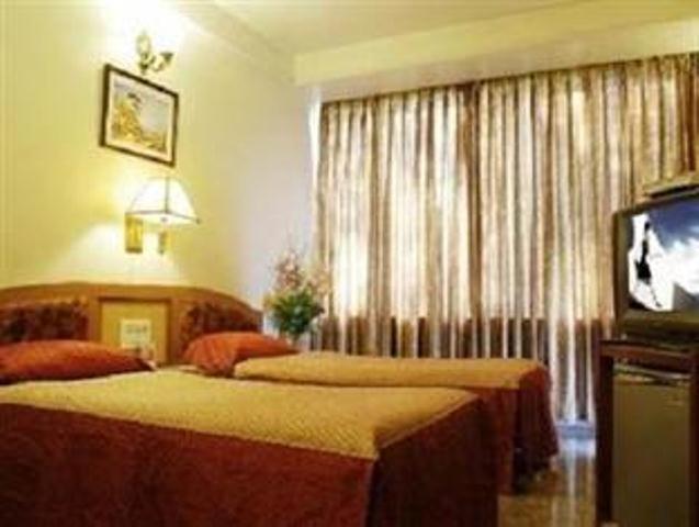 The Ambience Hotel Πούνε Δωμάτιο φωτογραφία