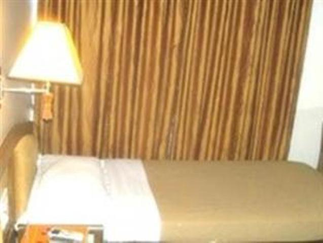 The Ambience Hotel Πούνε Δωμάτιο φωτογραφία