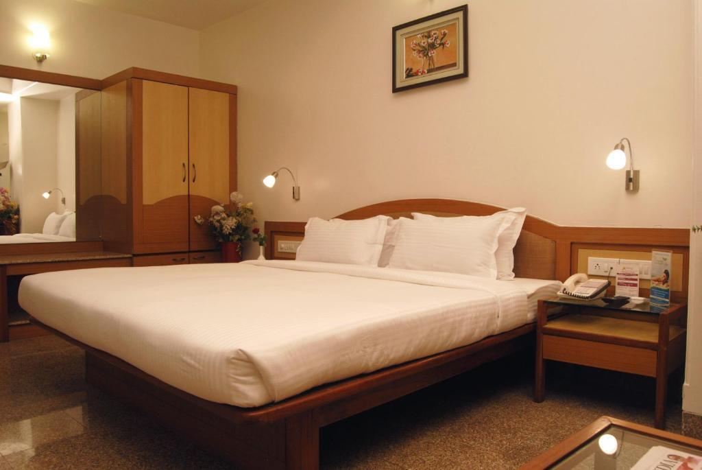 The Ambience Hotel Πούνε Δωμάτιο φωτογραφία